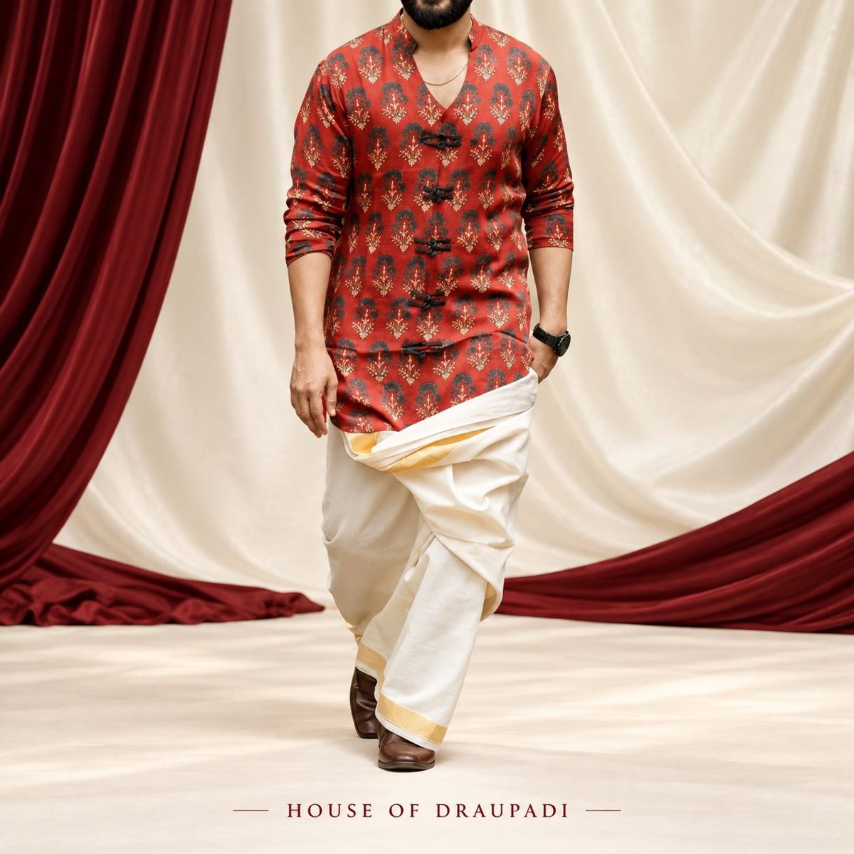 Man in red kurta and kasavu mundu